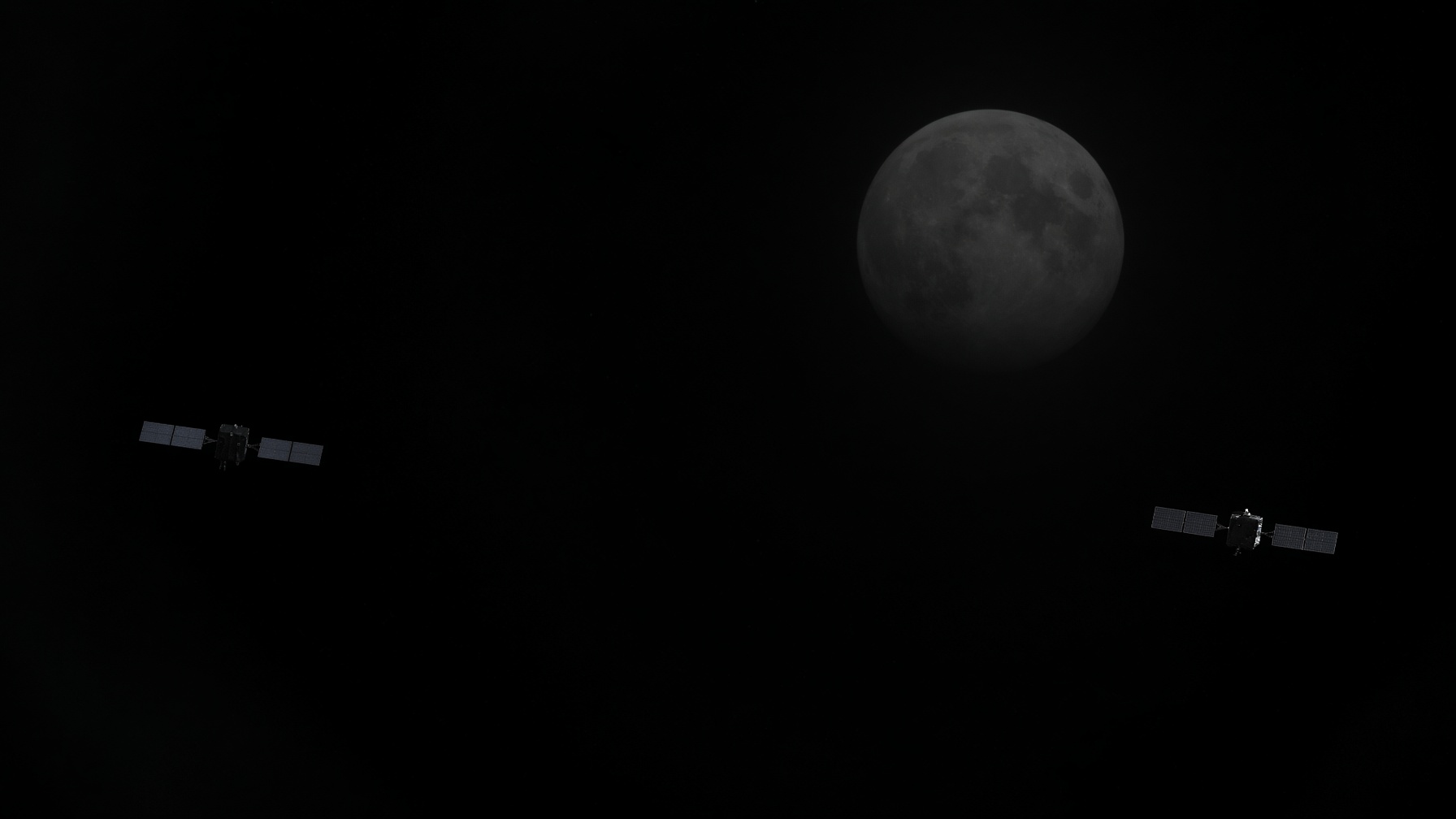 Two distant dark satellites against a faint Moon in empty cislunar space.