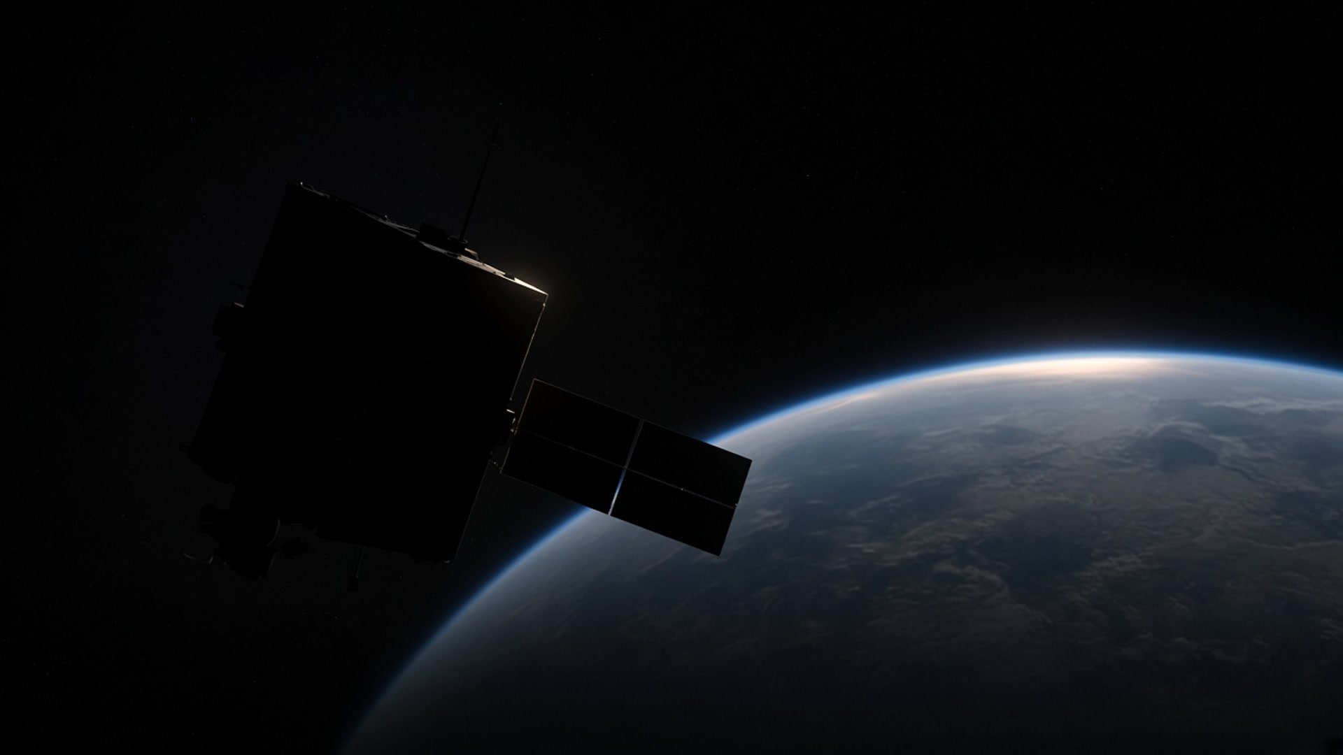 Dark EO sat silhouette over a soft Earth limb.